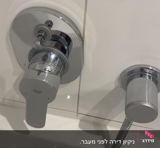 ברז אמבטיה וכפתור שליטה על מים
